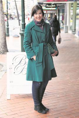 Katherine wears a Carlson scarf, 1960s Selby coat and boots from Head Over Heels in Christchurch.