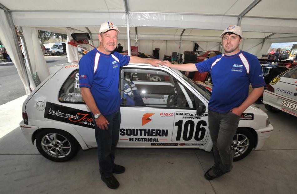 Dennis Ham and Ken Sinclair, both of Dunedin, and their Peugeot 106.