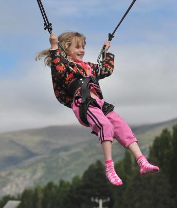 Helena Visser (6) from Cromwell enjoys the off-track entertainment.