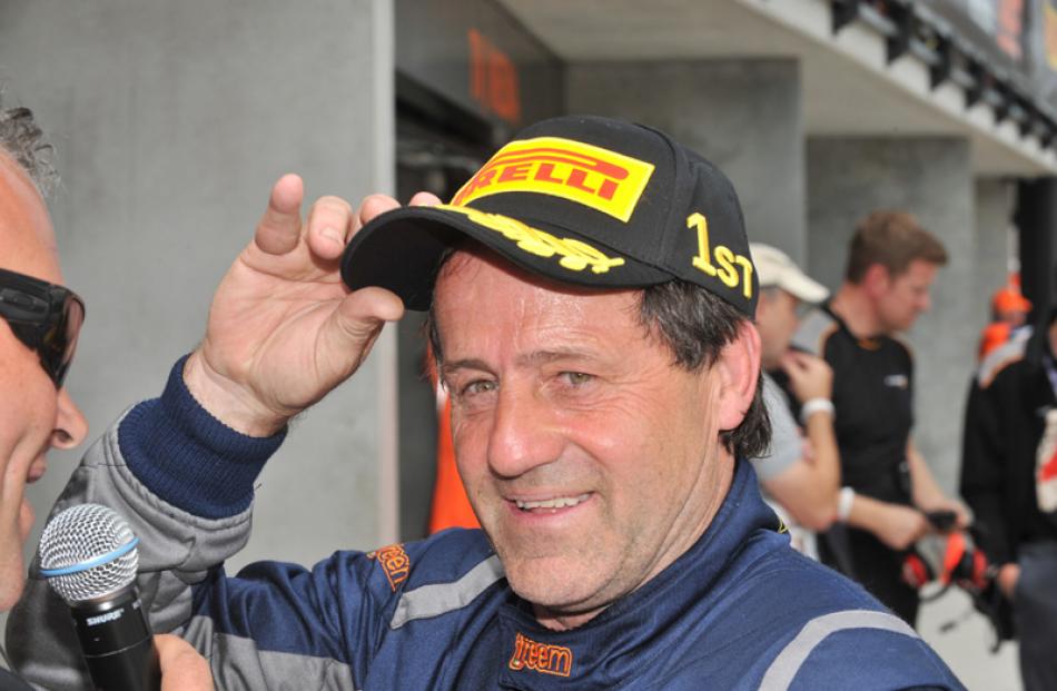 Winners are grinners, track owner Tony Quinn was on a high after winning an Australian GT race.
