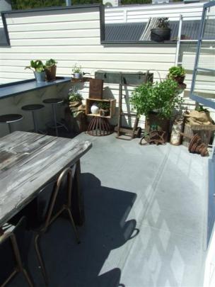 The outdoor dining area of the Chop Shop Food Merchants was designed to bring a slice of the New...