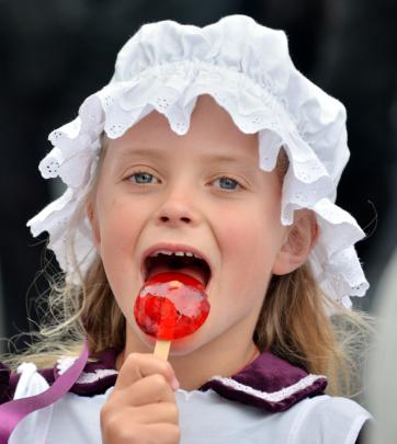 Thea Davis (8), of Dunedin, enjoys a sweet treat.