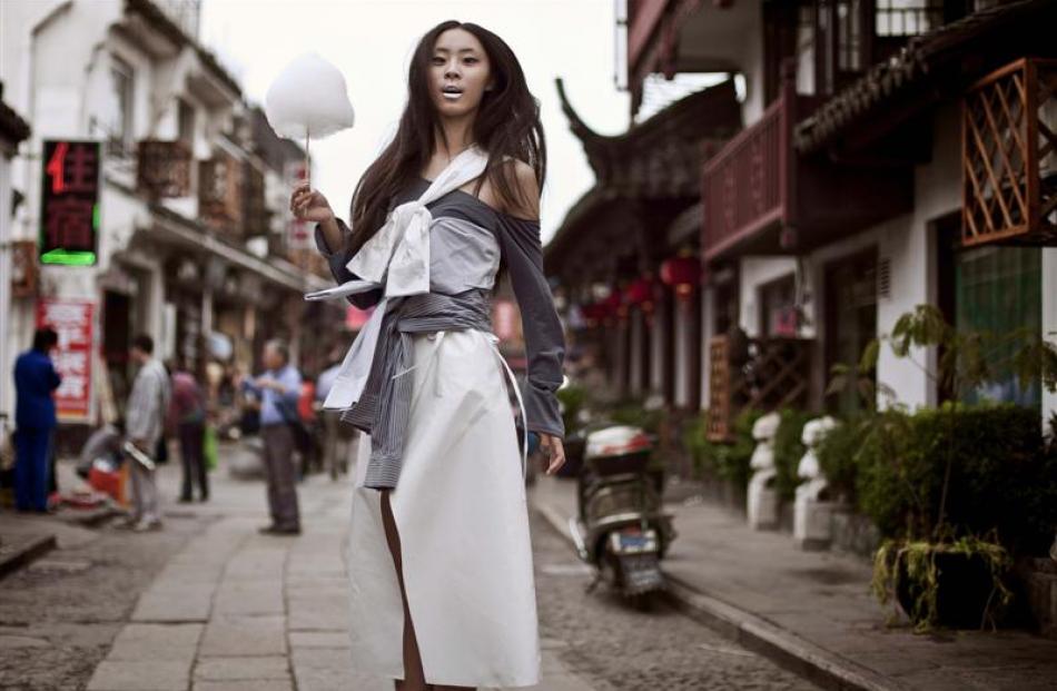 Lauren Arthur's designs step into the streetlife of Shanghai.