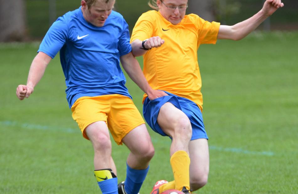 Thomas Cowie (Otago Blue) and Levi Buckingham (Otago Gold) contest the ball during a special...