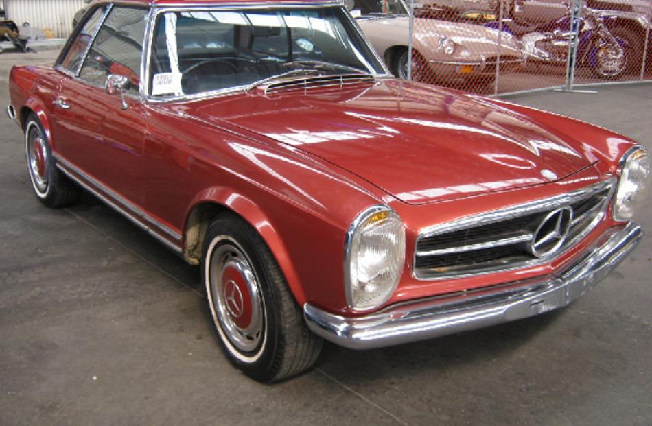 1969 Mercedes-Benz 280SL bought $65,000, sold for $58,000.