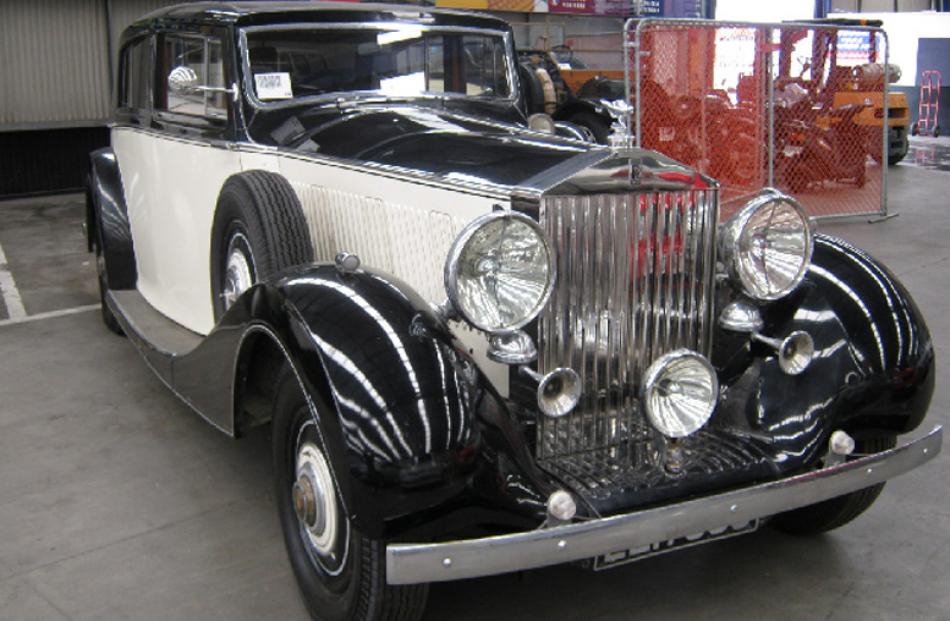 1938 Rolls Royce  Phantom III, bought for $200,000, sold for $97,100.