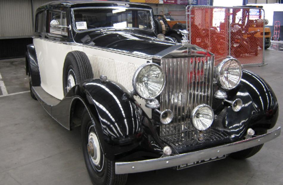 1938 Rolls Royce Phantom III, bought for $200,000, sold for $97,100.