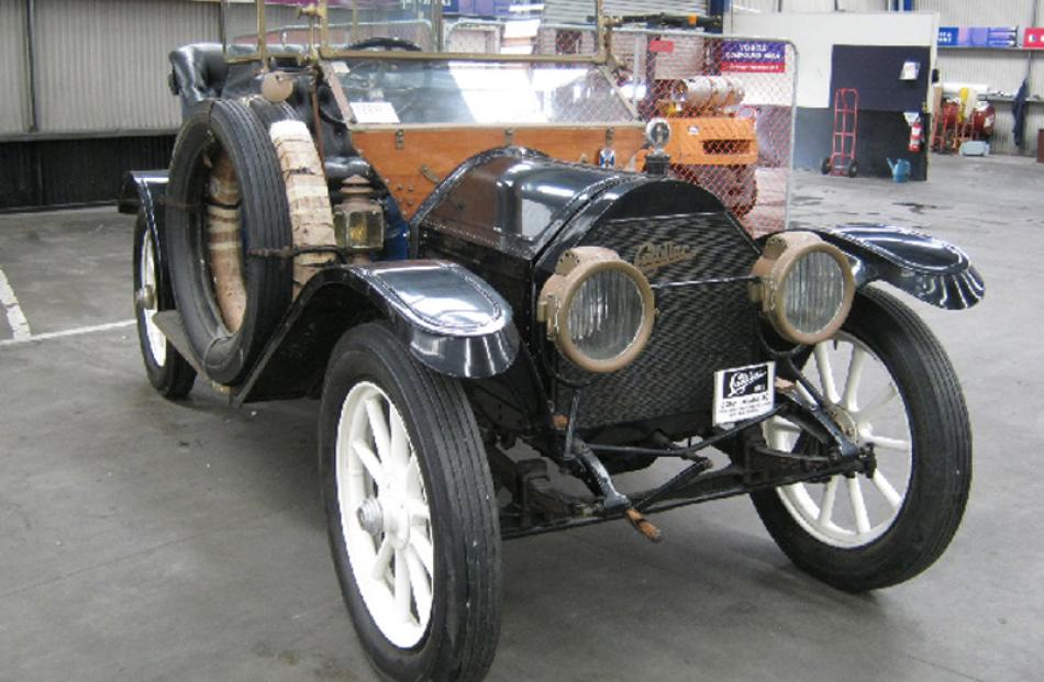 1911 Cadillac 30 Saloon, bought for $54,000, sold for $56,000.