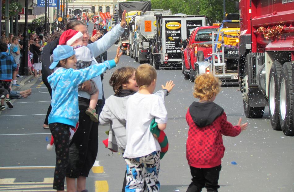 Children try to get a closer look at Santa during the Oamaru Christmas Parade on Saturday.