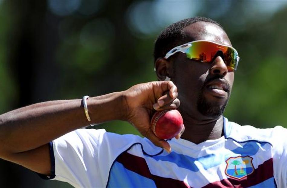 West Indies offspinner Shane Shillingford bowls in the nets.