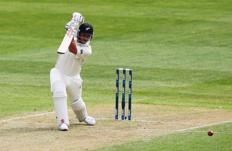 Hamish Rutherford hits a boundary through the off side. Photo by Getty Images