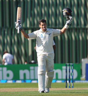 Ross Taylor celebrates his century on day one of the first test between New Zealand and the West...