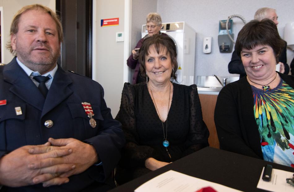 Dunstan volunteer firefighter Neil Jordan, Vicki Jordan and Annette Greaves, all of Alexandra.