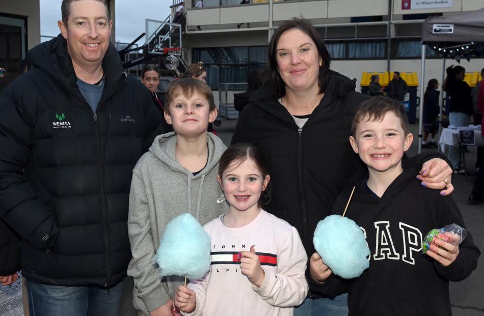 Mike and Kate Mullan, both of Dunedin, with their nephew Taj Morey, 11, and their children Keira,...