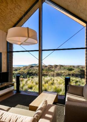 The double-height volume in the living area and the glazed end wall make the crib's 55sq m...