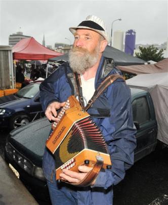 Jock  plays the diatonic button accordion.