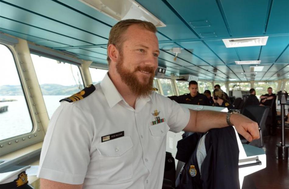 HMNZS Otago commanding officer Lieutenant-commander Rob McCaw on the bridge before departure...