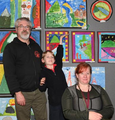 Exhibitor Hunter Draffin, 9, of Musselburgh School, with his parents Simon and Alana Draffin....
