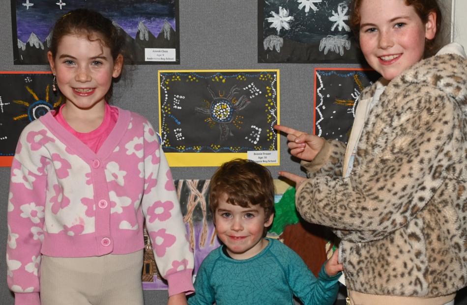Siblings Lola, 8, Franco, 3, and exhibitor Bonnie Fraser, 10, of Andersons Bay School.