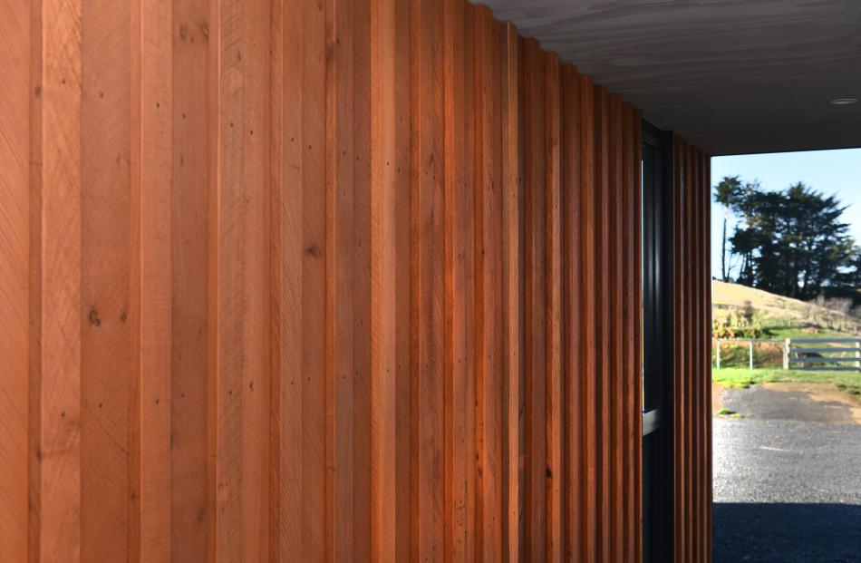 The rough-sawn macrocarpa cladding was felled and milled locally.

