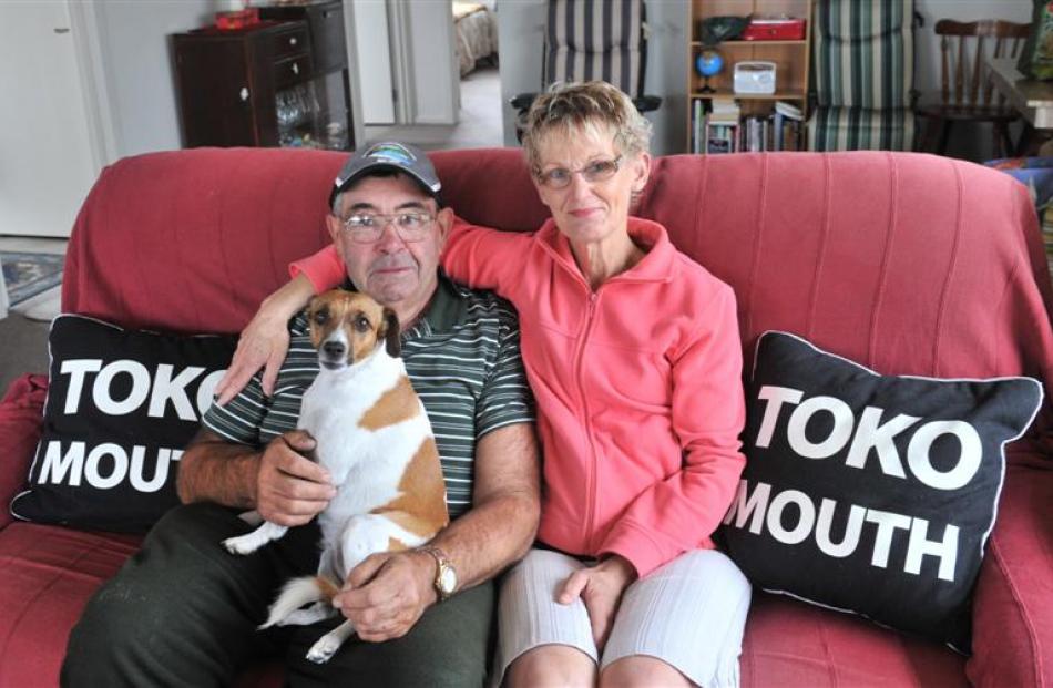 Toko Mouth crib owners Ronnie and Helen Pierce with their dog Trixie.