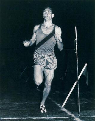 Peter Snell crossing the finishing line when breaking the world mile record in Wanganui in 1962....