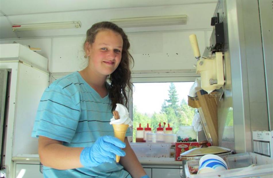 Sophie Brien, from Oamaru, dishes out some chilled refreshments at Fisherman's Bend.