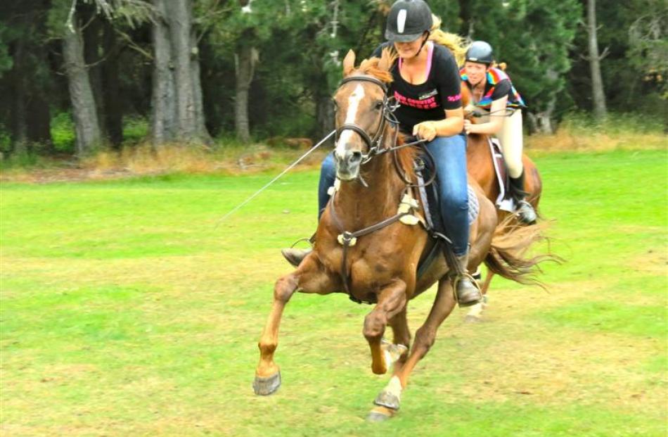 Casey Irvine, of Glenorchy, on Hemi, maintains her narrow lead over Holly Sinclair, formerly of...