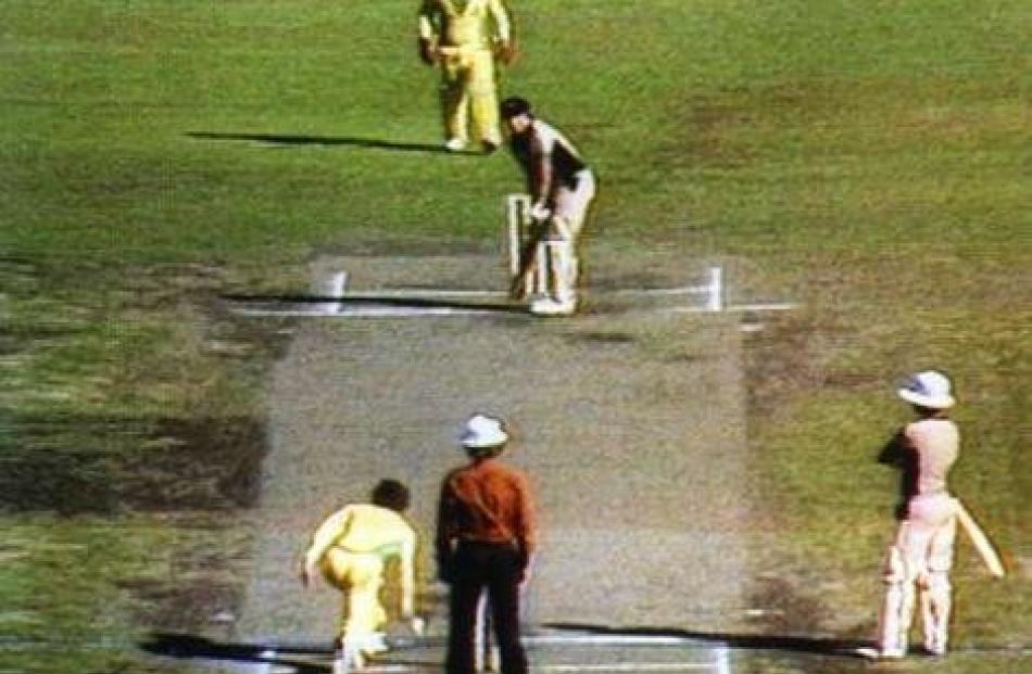 Australian bowler Trevor Chappell delivers the underarm ball to New Zealand batsman Brian...