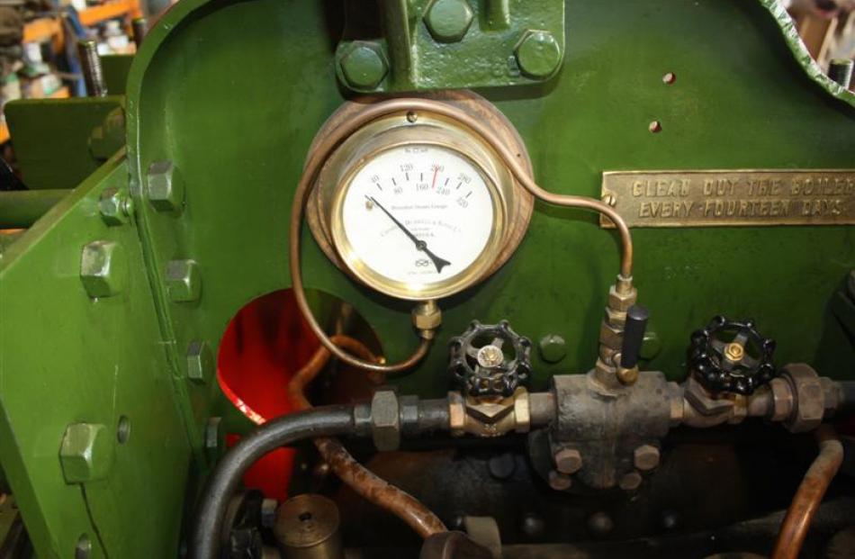 The steam pressure gauge.