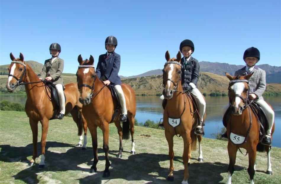 Young riding competitors are Charlotte Chapman-Cohen (11) on Abapsley Gentle Ways, Penelope...