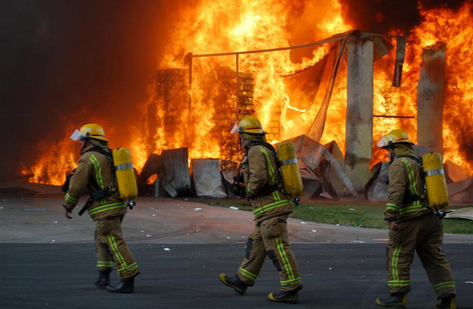 Fireman prepare to fight the massive fire at Icepak Coolstores. Photo by NZPA Phillipa Stevenson.