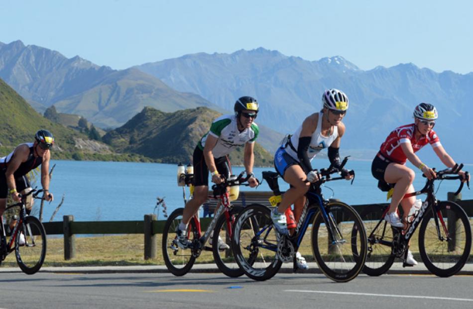 Lake Wanaka Half individual competitors climb past Lake Hawea.