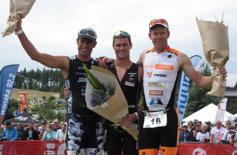 Challenge Wanaka elite men's winner Dylan McNeice (centre), of Christchurch, with Richard Ussher ...