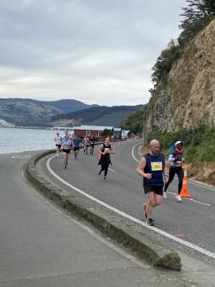 Otago Harbour makes a great backdrop for the runners, including half-marathon competitor Michael...