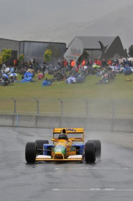 Track owner Tony Quinn drives Michael Schumacher's F1.