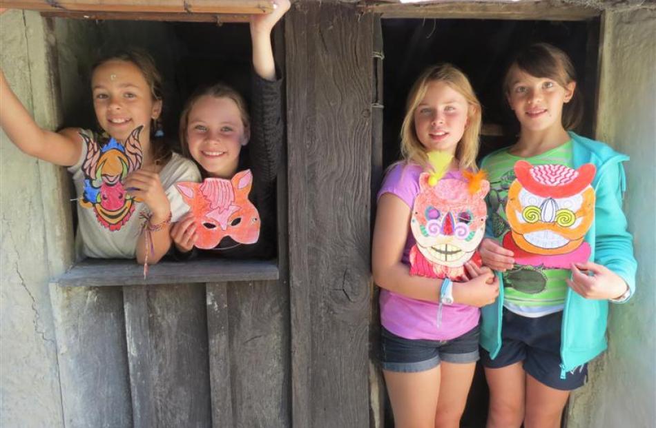 Zoe Ries (9), Jessica MacDonald (8) and Amelia Peasey (10), all of Arrowtown, with Emily Spicer ...