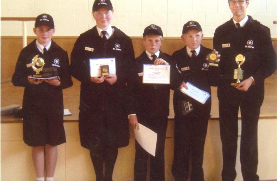 Celebrating their success at a recent prizegiving are Mosgiel St John Youth Cadets (from left)...