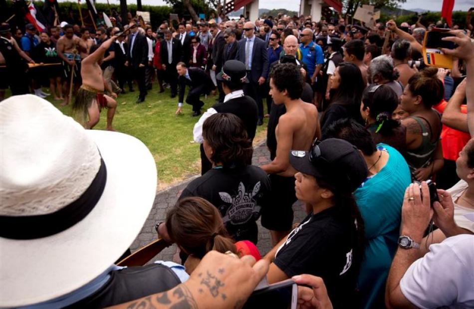 Prime Minister John Key walks on to Te Tii Marae  in Waitangi. Photos by The New Zealand Herald.