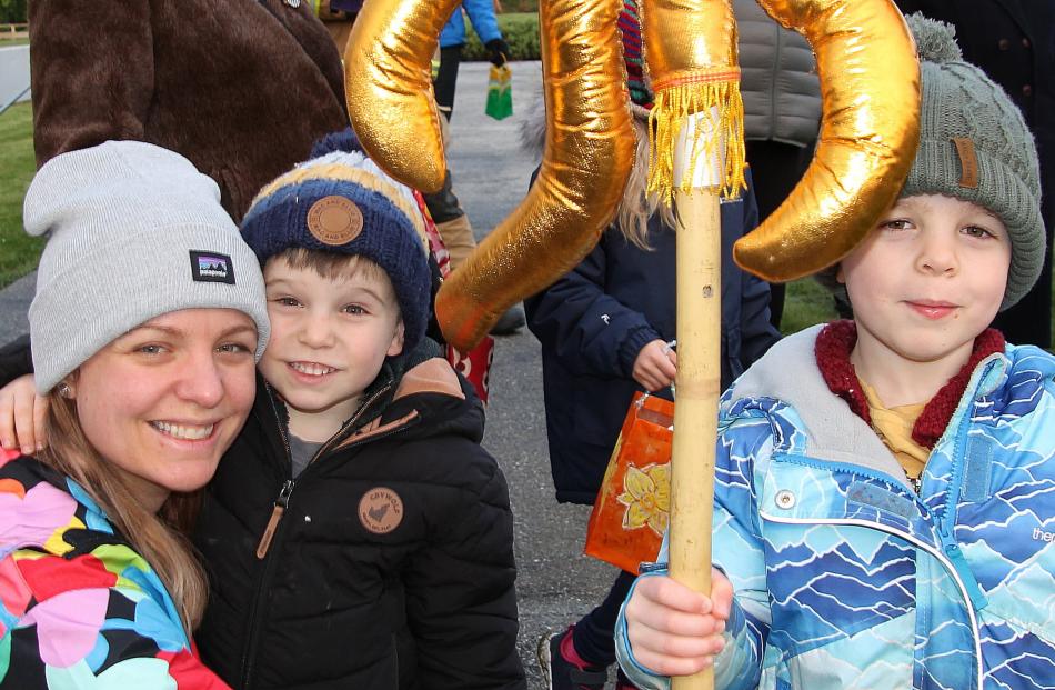 Katie, Eddie, 4, and Felix Macrae, 6, all of Lawrence.