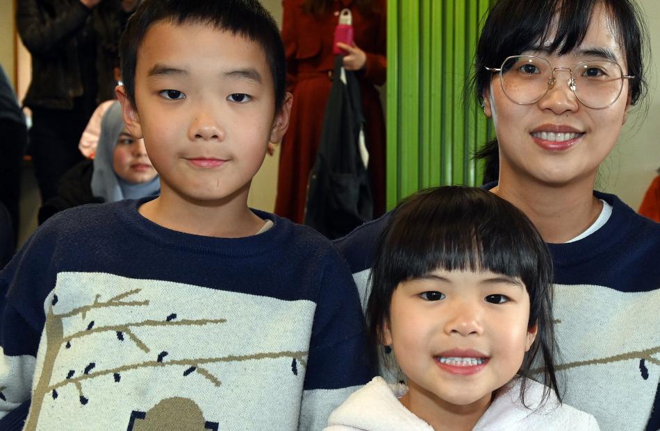 Leo Huang, 8, his sister Amy Huang, 5, and their mother Lily Chen, all of Dunedin.