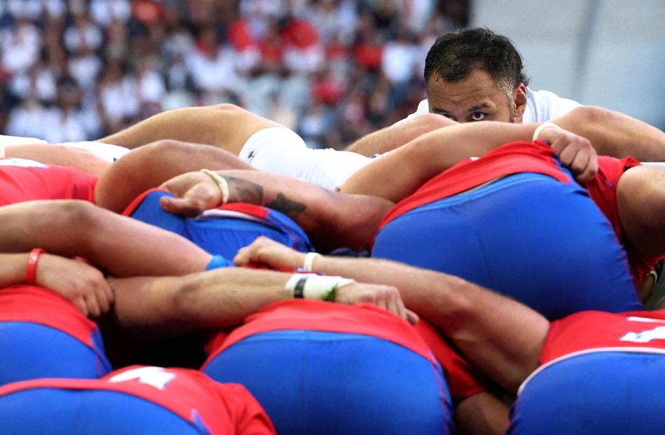 England's Billy Vunipola looks up from a scrum during his team’s game against Chile at Stade...