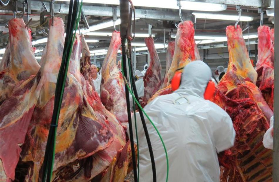 Finegand works staff work on beef carcasses. Photos by Yvonne O'Hara.