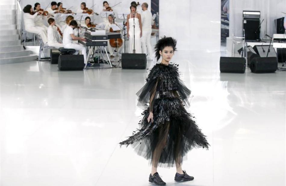 A model wears flats during German designer Karl Lagerfeld's show for French fashion house Chanel...