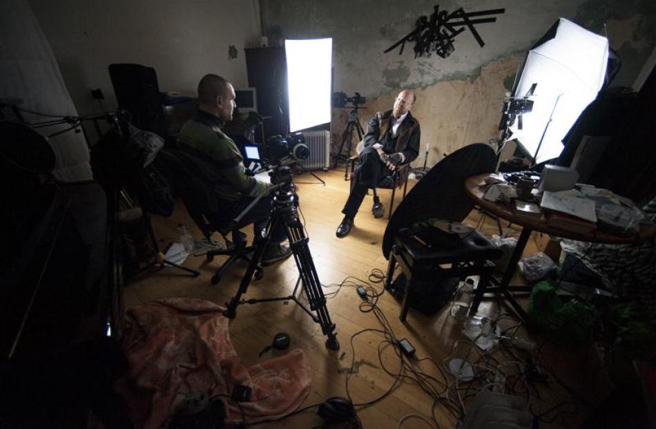 Dunedin musician Nick Knox (right) is interviewed by J. Ollie Lucks during filming of mini...