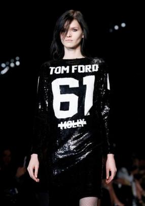 A model presents a creation from the Tom Ford Autumn/Winter 2014 collection during London Fashion...