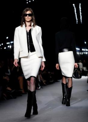 Models present creations from the Tom Ford Autumn/Winter 2014 collection during London Fashion...