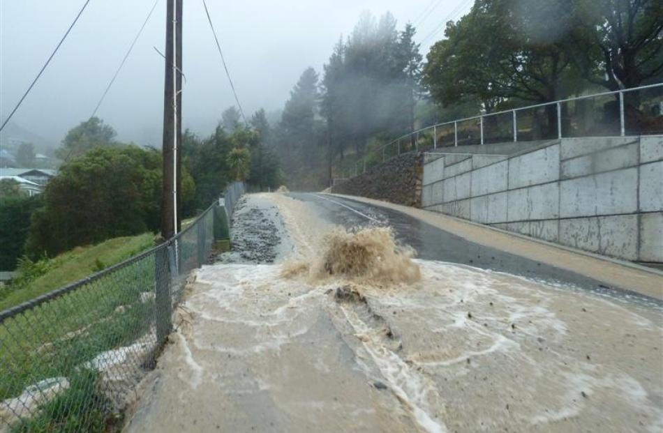 Flooding in Canterbury St, Lyttelton. Photo by Daniel Blake