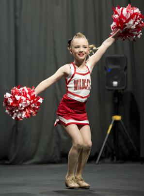 Charlotte Whalan, 9, demonstrates her cheerleader skills in the open tap under-10 solo section.