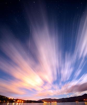 The International Space Station(streak of light) passes over top of Dunedin. Photo by Ian Griffin